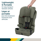 Hand carrying the Safety 1st 3-in-1 harness booster on a white background, highlighting its lightweight and portable design for easy vehicle transfers.