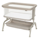 Safety 1st EasyGlide Bedside Bassinet with all-around breathable mesh sides, storage basket, and lockable wheels.